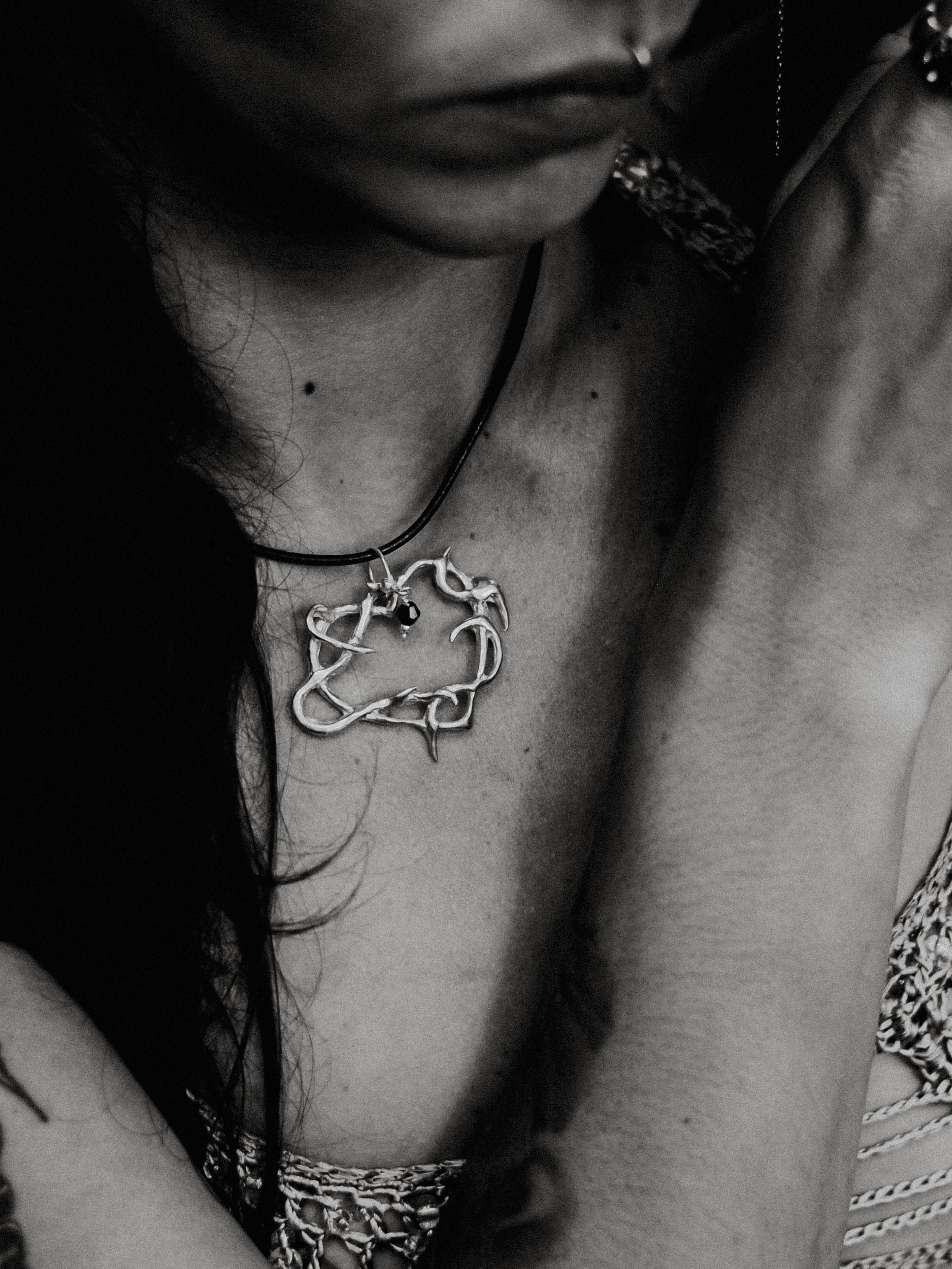 Thorn pendant on cord